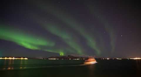 Northern Lights by Boat picture