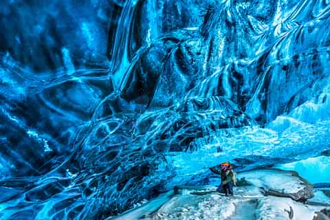 Traveler in Ice Cave