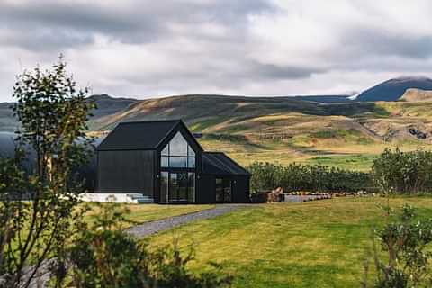 Luxury Resort In West Iceland With Mountain In The Background