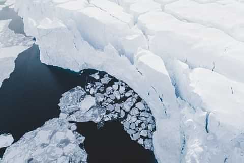 Steep ice wall disko bay photo benjamin hardman visit greenland min