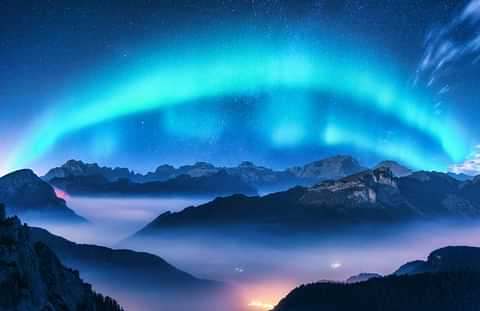 174 aurora borealis above mountains in fog at night W8 V75 CN